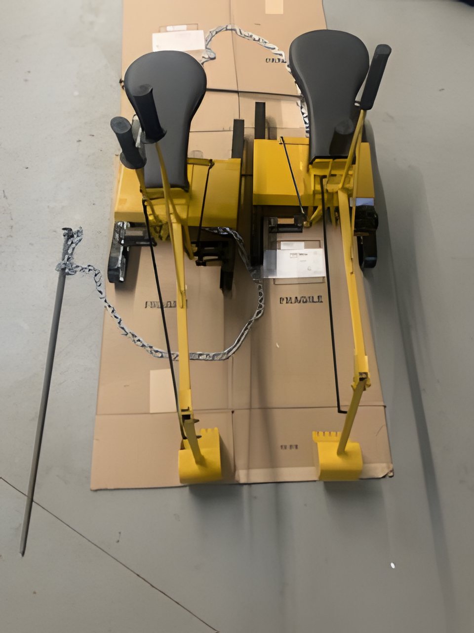 Two Bedrock Diggers packed on cardboard, ready for shipping
